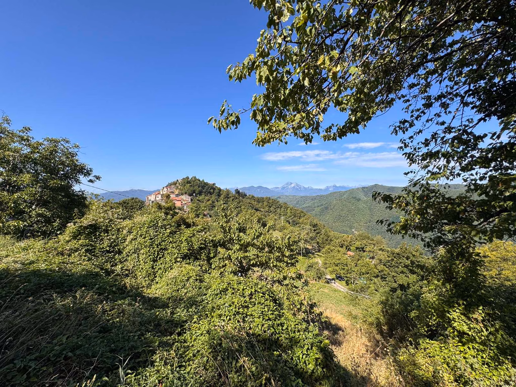 Montefegatesi and the Apennine mountains seen from the walking route