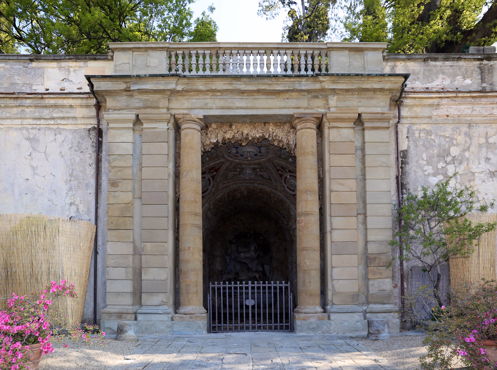 The stone entrance to the Grotto of the Animals in the Castello garden